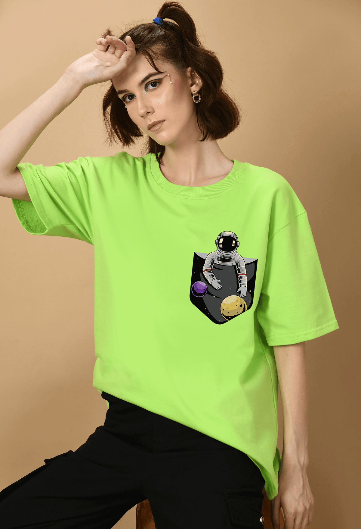 Pocket astronaut printed neon green oversized t-shirt by offmint